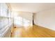 Bright living room showcasing hardwood floors and natural light from large windows at 2442 Wentworth Ne Dr, Atlanta, GA 30345