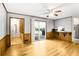 Spacious living room featuring beautiful hardwood floors and sliding glass doors at 2442 Wentworth Ne Dr, Atlanta, GA 30345