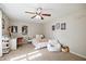 Bright bedroom with ample natural light, a ceiling fan, and plenty of space to enjoy at 5296 Camden Lake Nw Pkwy, Acworth, GA 30101