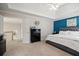 Spacious main bedroom features tray ceiling and large ensuite bathroom entry at 5296 Camden Lake Nw Pkwy, Acworth, GA 30101