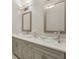 Bathroom showcasing dual vessel sinks set atop a gray vanity at 828 Canterbury Overlook Ne, Atlanta, GA 30324