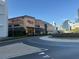 View of The Cheesecake Factory and surrounding retail spaces in a modern shopping center with lush landscaping at 828 Canterbury Overlook Ne, Atlanta, GA 30324