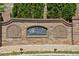 Elegant brick entrance sign for The Bluffs at Lenox, showcasing a welcoming community ambiance at 828 Canterbury Overlook Ne, Atlanta, GA 30324