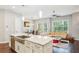 Open floor plan featuring kitchen, living room, hardwood floors, and abundant natural light at 828 Canterbury Overlook Ne, Atlanta, GA 30324