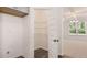 Pantry featuring wood floors, metal shelving and tons of storage for your convenience at 13918 Homer Ln, Covington, GA 30014