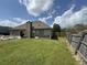 Fenced backyard with a well-kept lawn and patio; great for outdoor enjoyment and privacy at 140 Grayview Ct, Grayson, GA 30017