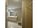 This primary bathroom features double sinks and a walk in shower at 140 Grayview Ct, Grayson, GA 30017