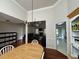Open-concept dining area with views into the living room and kitchen, creating a connected and inviting space at 140 Grayview Ct, Grayson, GA 30017
