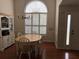 Dining room with a large window and a stylish light fixture, providing an elegant space for meals and gatherings at 140 Grayview Ct, Grayson, GA 30017