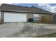 Driveway leading to a two-car garage with fenced backyard enhancing curb appeal and providing parking at 140 Grayview Ct, Grayson, GA 30017