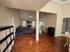 Spacious living room featuring hardwood floors, fireplace, ample natural light, and an open floor plan at 140 Grayview Ct, Grayson, GA 30017