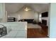 Living room with vaulted ceilings, fireplace, wood floors and lots of natural light at 140 Grayview Ct, Grayson, GA 30017