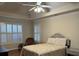 Comfortable main bedroom featuring hardwood floors, neutral paint and great natural light at 140 Grayview Ct, Grayson, GA 30017