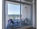 Serene balcony with seating, showcasing city views and natural light through sliding glass doors at 325 E Paces Ferry Ne Rd # 1405, Atlanta, GA 30305