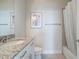 Modern bathroom featuring granite countertops, a vanity, and shower with bathtub at 325 E Paces Ferry Ne Rd # 1405, Atlanta, GA 30305