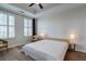 Calm bedroom features a tray ceiling, neutral decor, plantation shutters and modern ceiling fan for a relaxed atmosphere at 325 E Paces Ferry Ne Rd # 1405, Atlanta, GA 30305