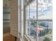 A city view from inside a window, featuring vibrant greenery at 325 E Paces Ferry Ne Rd # 1405, Atlanta, GA 30305