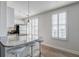 Open kitchen featuring granite counters, stainless appliances, and barstool seating at 325 E Paces Ferry Ne Rd # 1405, Atlanta, GA 30305