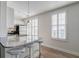 Open kitchen featuring granite counters, stainless appliances, and barstool seating at 325 E Paces Ferry Ne Rd # 1405, Atlanta, GA 30305