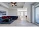 Open-concept living room boasts hardwood floors, recessed lighting, and a view into the dining area at 325 E Paces Ferry Ne Rd # 1405, Atlanta, GA 30305