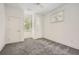 Bright bedroom with neutral carpet, white walls, and natural light from the windows at 4225 Maner Se St, Smyrna, GA 30080