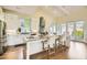 Bright, modern kitchen with granite countertops, a breakfast bar, and a seamless flow to the living area at 4225 Maner Se St, Smyrna, GA 30080