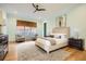 Serene main bedroom with neutral tones, a ceiling fan, and ample natural light at 4225 Maner Se St, Smyrna, GA 30080