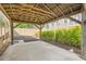 Covered patio with a concrete floor, wooden beams, and outdoor privacy at 4225 Maner Se St, Smyrna, GA 30080