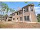 Beautiful backyard with a spacious deck and lush greenery at 7497 Treehouse Ct, Douglasville, GA 30135