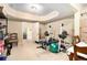 Workout area featuring exercise equipment and neutral carpet at 7497 Treehouse Ct, Douglasville, GA 30135