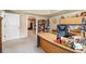 Bright home office with custom built-ins and an expansive desk area at 7497 Treehouse Ct, Douglasville, GA 30135