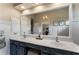 Bright bathroom with a large mirror, double sinks, and ample counter space at 2630 Milford Ln, Alpharetta, GA 30009