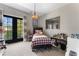 Cozy bedroom featuring a bed, a large window, and space for toys and collectibles at 2630 Milford Ln, Alpharetta, GA 30009