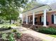 Academy Park Clubhouse with brick facade and white pillars at 2630 Milford Ln, Alpharetta, GA 30009