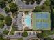 Aerial shot of the community pool and tennis courts with parking at 2630 Milford Ln, Alpharetta, GA 30009