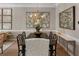 Beautiful dining room with stylish chandelier and table setting, perfect for entertaining at 2630 Milford Ln, Alpharetta, GA 30009