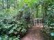 Wood-chipped walking path toward gazebo in wooded area at 2630 Milford Ln, Alpharetta, GA 30009
