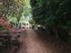 Scenic mulch walking path in the community with white gazebo at 2630 Milford Ln, Alpharetta, GA 30009