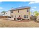 Large backyard with wood deck and lush green space, great for outdoor activities at 5775 Stephens Mill Dr, Sugar Hill, GA 30518