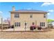Spacious backyard featuring a large wooden deck, perfect for outdoor gatherings at 5775 Stephens Mill Dr, Sugar Hill, GA 30518
