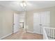 Neutral-toned bedroom with carpet, offering space and natural light, perfect for relaxation at 5775 Stephens Mill Dr, Sugar Hill, GA 30518