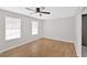 A bright and airy bedroom with natural light and hardwood flooring at 111 Evergreen Trl, Cartersville, GA 30121