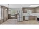 Eat-in kitchen with stainless steel refrigerator and range with lots of cabinet space at 111 Evergreen Trl, Cartersville, GA 30121