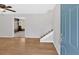 Open-concept living room featuring new flooring and staircase at 111 Evergreen Trl, Cartersville, GA 30121