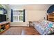 Spacious living area featuring hardwood floors, natural light, and ample room for entertaining at 1218 Cabots Ln, Auburn, GA 30011