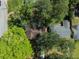 An aerial view of a home surrounded by lush greenery in a residential neighborhood at 1629 Anita Ne Pl, Atlanta, GA 30306
