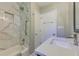 Beautiful bathroom features modern vanity with white marble countertop, and a tiled shower at 1629 Anita Ne Pl, Atlanta, GA 30306