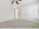 A simple bedroom with a view to the hallway and a large closet at 2155 Washington Dr, Douglasville, GA 30135