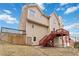 Multi-story home featuring a deck and staircase on the back at 2155 Washington Dr, Douglasville, GA 30135