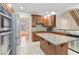 Modern kitchen boasts stainless steel appliances, granite countertops, and a center island at 2155 Washington Dr, Douglasville, GA 30135